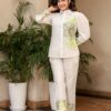 This is a very elegant and classy co-ord set It features an off-white shirt and pant set with fresh light green floral prints. The shirt has a large floral design on the front and matching prints on the sleeves, giving it a stylish and unique look. The collared neckline and front button detailing add a smart and modern touch. The pants are in the same off-white shade with matching floral prints at the bottom, perfectly coordinating the entire outfit. This outfit is perfect for casual outings, brunches, small get-togethers, or festive daytime events. Paired with simple heels, it gives a graceful and sophisticated look. Fabric - Cotton flex kurti cotton flex pant. It is a two-piece ensemble is a White Floral Embroidered Shirt and Pants Co-ord Set. The outfit features an ivory or white base color, often crafted from breathable materials like cotton or chanderi silk.   Product Details  Top: A collared shirt with a front button closure, featuring prominent floral embroidery (typically in shades of green or yellow) on one side and the cuffs. Bottom: Matching straight-cut pants or trousers, often adorned with similar floral embroidery at the hem to complete the coordinated look. The  Pattern Solid, Fabric Cotton, Occasion Party Wear, Number of Pieces 2-Piece Set, Bottom Type Pant, Sleeve Length 3/4 Sleeves, Neck Type Shirt Collar, Size XL, 3XL, XXL, L, M, Workmanship Embroidery, Color  white