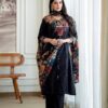 Premium Cotton Kalamkari Print Patchwork Suit Set. It features a solid black straight-cut kurta accented with a vibrant multi-colored Kalamkari printed patchwork yoke and fabric hanging tassels down the front placket. The set is completed with matching solid black wide-leg palazzo pants and a coordinated all-over Kalamkari printed dupatta. This popular traditional ensemble is available across several boutique platforms and ethnic wear marketplaces:
